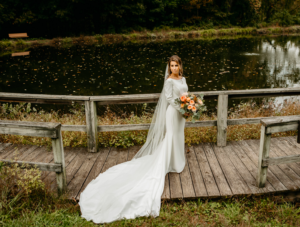 Bride Posing by Lake at Springton Manor Farm