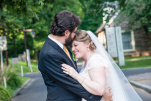 AMC Photography Studios Wedding Photographer Husband Kissing Bride